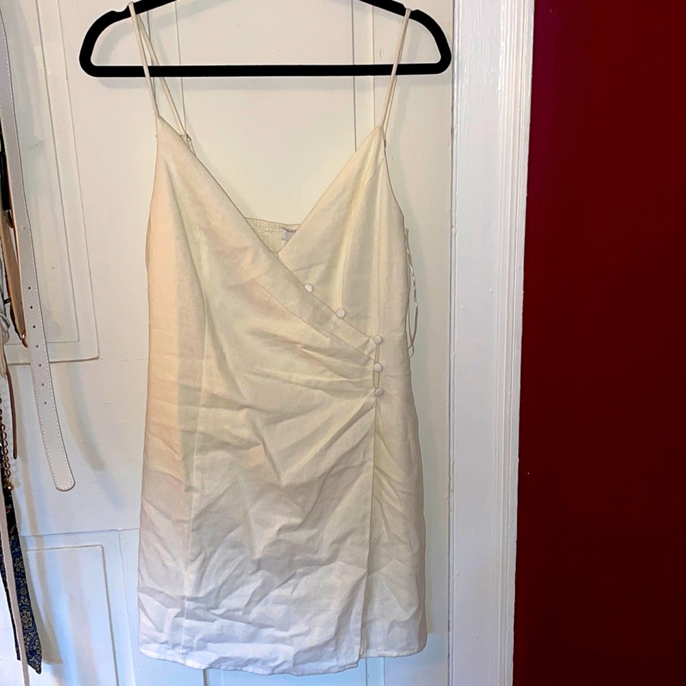 Cream spaghetti strap dress with button detail